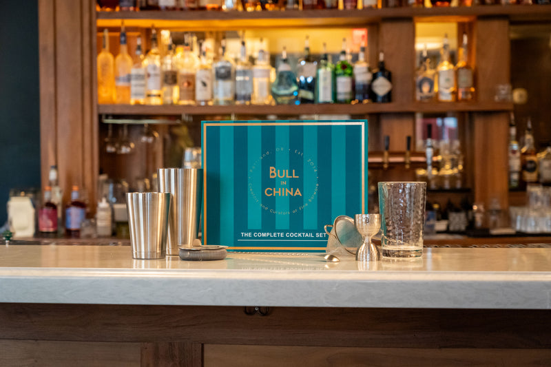 The Complete Cocktail Set displayed on a home bar, perfect for mixing cocktails and enhancing bartending skills.