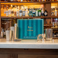 The Complete Cocktail Set displayed on a home bar, perfect for mixing cocktails and enhancing bartending skills.