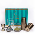 Complete Cocktail Set featuring shaker, strainer, jigger, and glass in a stylish box, perfect for home bartending.