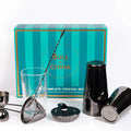 The Complete Cocktail Set with shaker, jigger, strainer, glass, and box for home bartending.