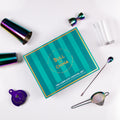 Colorful The Complete Cocktail Set with bar tools for aspiring bartenders, perfect for home mixology.